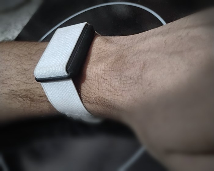 BitwellBand 1 with a white strap, on the wrist